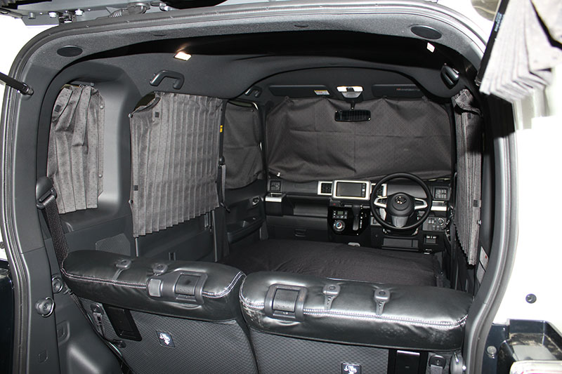 NICONICO Rent a Car Mini Camp Car with privacy curtains.